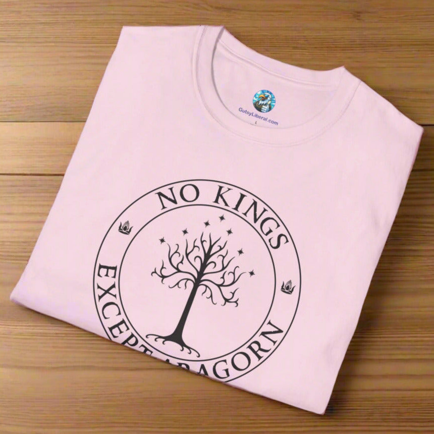 A pink t-shirt with text that says "No kings except Aragorn" and a graphic of a tree with seven stars above it and two crowns of the king of Gondor.