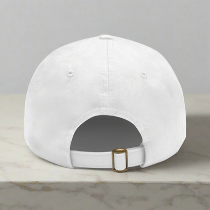 White baseball cap with a gold buckle on a white background